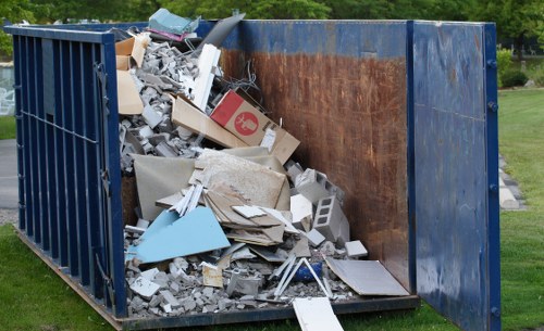 Professionals performing loft clearance in a Hornsey home